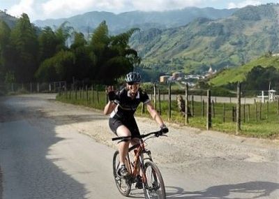 Angela Riddell Cycling on the  tour with redspokes